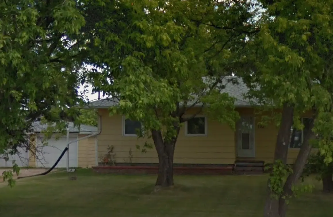 Yellow bungalow-style house in Brandon, MB